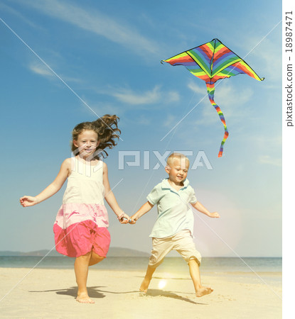 Sister Brother Beach Vacation Summer Playing Kite Concept Sister Brother Beach Vacation Summer Playing Kite Concept 18987471