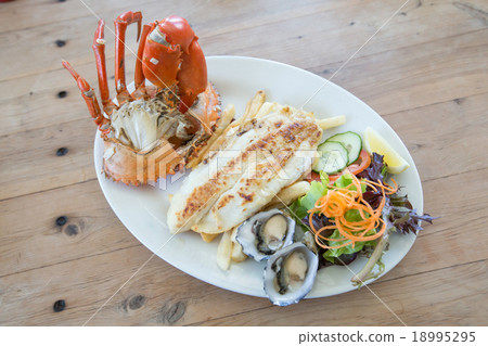 fish steak with big crab and fresh oyster fish steak with big crab and fresh oyster 18995295