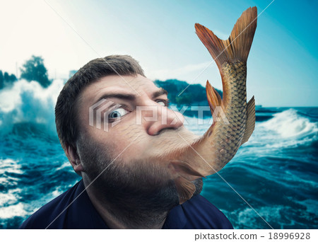 Man eating fish Man eating fish 18996928