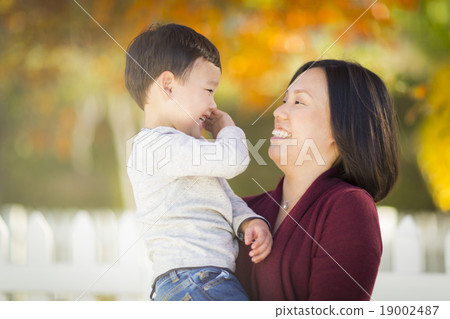 Chinese Mom Playing and Holding Her Mixed Race Boy Chinese Mom Playing and Holding Her Mixed Race Boy 19002487