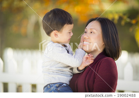 Chinese Mom Playing and Holding Her Mixed Race Boy Chinese Mom Playing and Holding Her Mixed Race Boy 19002488