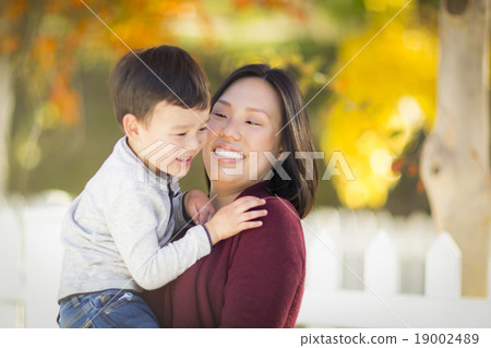 Chinese Mom Playing and Holding Her Mixed Race Boy 19002489