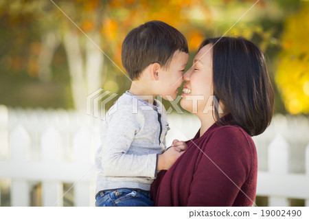 Chinese Mom Playing and Holding Her Mixed Race Boy Chinese Mom Playing and Holding Her Mixed Race Boy 19002490