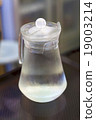 a clear jug of cold drinking water  19003214
