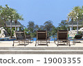 folding hammocks besides swimming poll 19003355