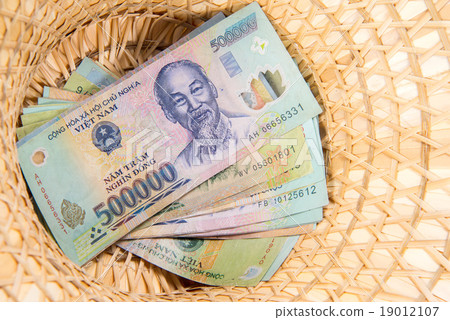 Vietnamese money, dong backnote inside hat Vietnamese money, dong backnote inside hat 19012107