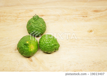 Bergamot fruit on wood background. 19013407
