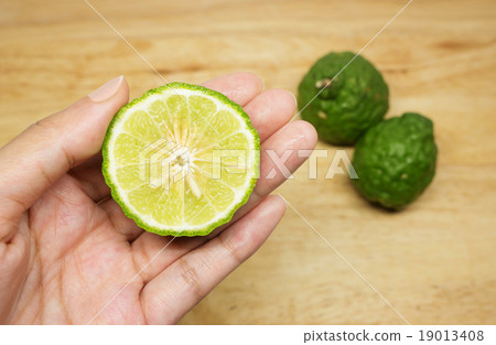 Bergamot fruit on wood background. 19013408