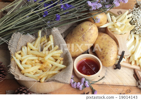 French fries and fresh sliced potatoes  19014143
