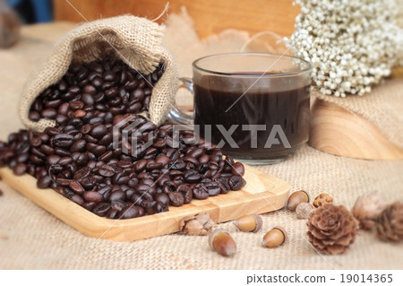 Roasted coffee beans with hot coffee 19014365