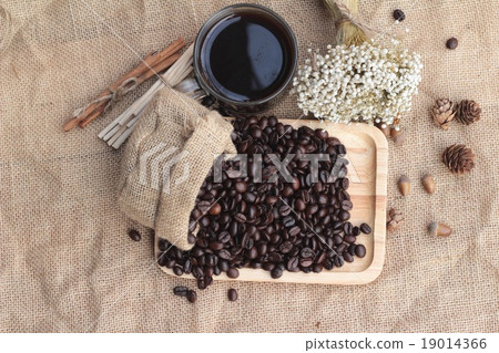 Roasted coffee beans with hot coffee Roasted coffee beans with hot coffee 19014366