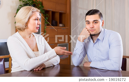 Serious aged female and young boyfriend 19019272