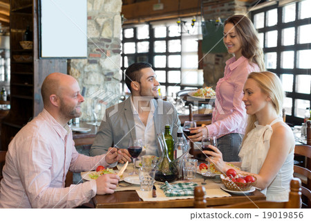 People having dinner rural restaurant 19019856