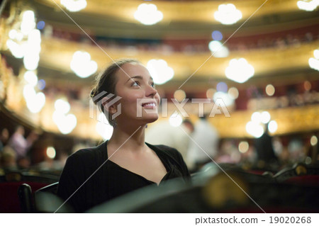 Girl in auditorium of teatre Girl in auditorium of teatre 19020268