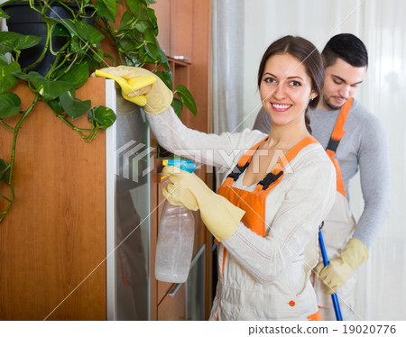 Professional cleaners at work 19020776