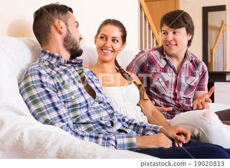 Three friends indoors 19020813