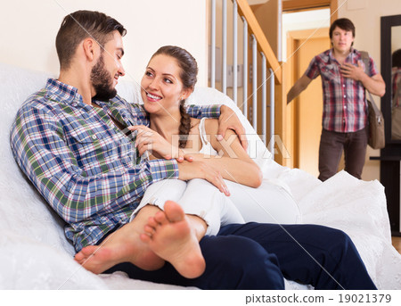 Husband watching how partner is cheating 19021379