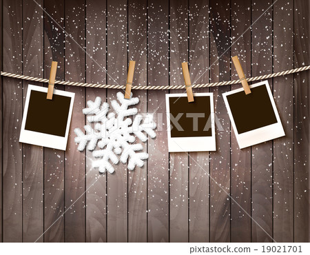 Christmas background with photos and a snowflake. Christmas background with photos and a snowflake. 19021701