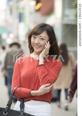 A young lady with a smartphone 19022018