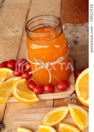 Orange juice with fresh orange fruits sliced. 19022438
