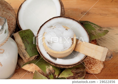 white coconut and milk on wood background 19022856