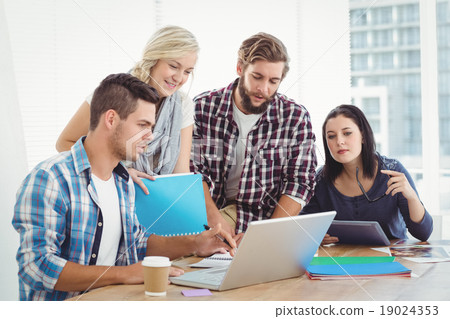 Business people working on laptop Business people working on laptop 19024353