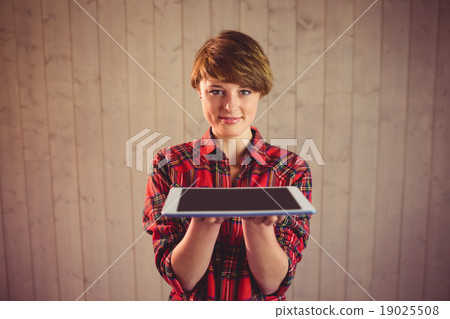Pretty young woman holding tablet 19025508
