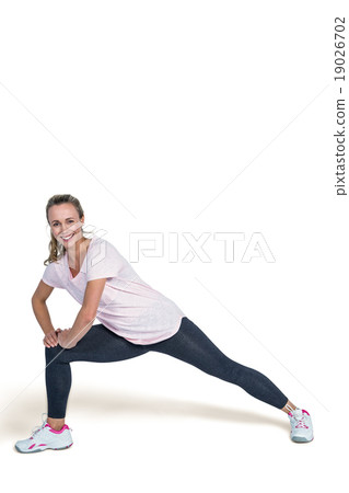 Portrait of cheerful sporty woman exercising Portrait of cheerful sporty woman exercising 19026702