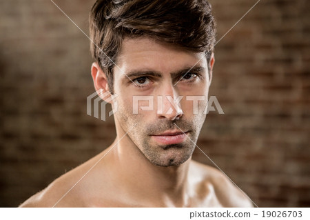 Portrait of a serious man 19026703