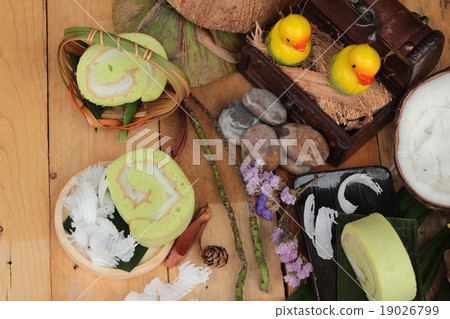 Green cake rolls filled with coconut. Green cake rolls filled with coconut. 19026799