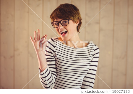 Pretty young woman posing with striped clothes Pretty young woman posing with striped clothes 19027153