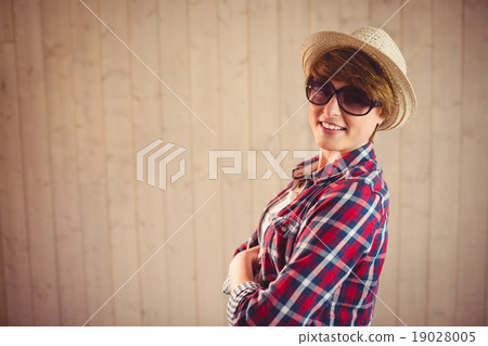 Young smiling woman posing with sunglasses 19028005