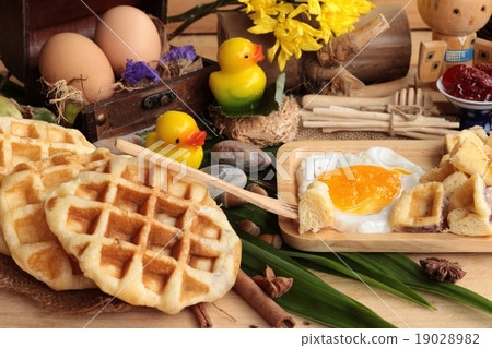 Sweet waffles and fresh milk with jam and egg Sweet waffles and fresh milk with jam and egg 19028982