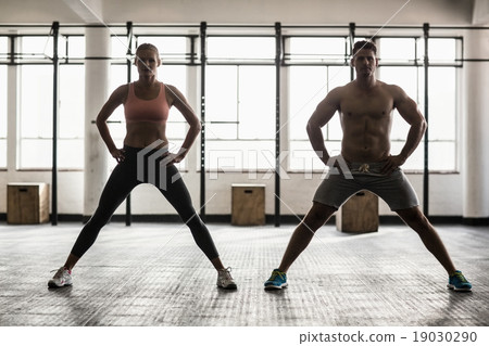 Two fit people doing fitness Two fit people doing fitness 19030290