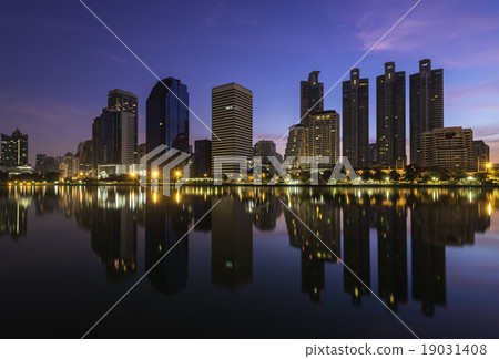 Bangkok city downtown at sunrise with reflection  19031408