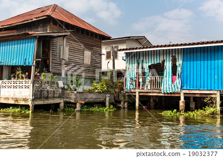 Slum on dirty canal in Asia 19032377