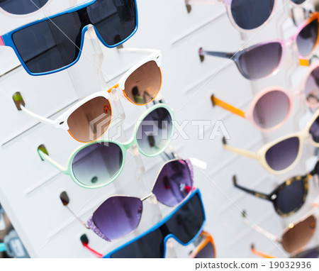 Rack with sunglasses Rack with sunglasses 19032936