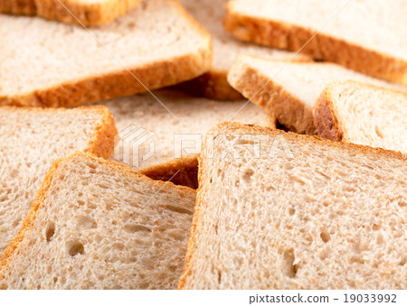 Heap of toasted bread slices 19033992