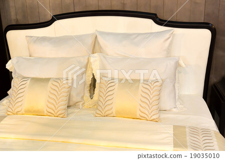 Colorful pillows on hotel bed Colorful pillows on hotel bed 19035010