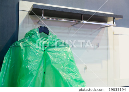 Green raincoat 19035194