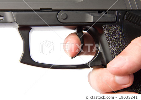 Pushing the handgun trigger Pushing the handgun trigger 19035241
