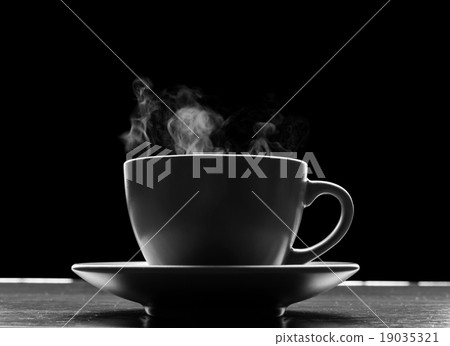 Cup with hot liquid on black 19035321