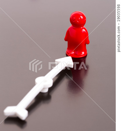Red toy man and arrow 19035598