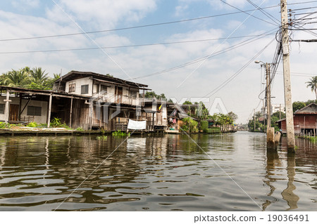 Slum on dirty canal in Thailand 19036491