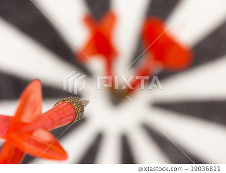 Red flying dart to dartboard Red flying dart to dartboard 19036811
