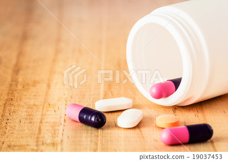 Pour a bottle of pills Pour a bottle of pills 19037453