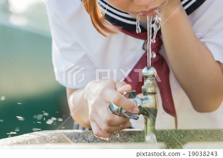 Girls drinking water Girls drinking water 19038243