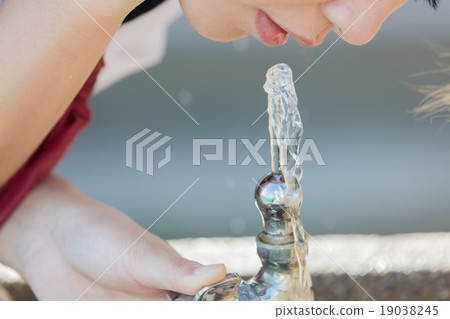 Girls drinking water Girls drinking water 19038245