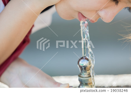 Girls drinking water Girls drinking water 19038246