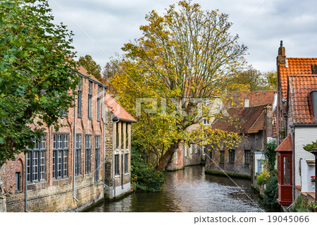 Medieval houses over the canal in Bruges Medieval houses over the canal in Bruges 19045066